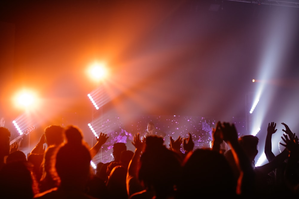 group of people inside on stage