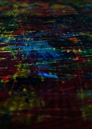 An abstract painting blending dark shadows with vibrant lines, capturing mental chaos and clarity in one frame.