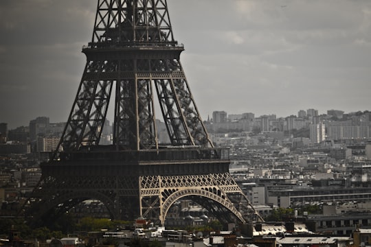 grayscale photography of Eiffel tower in Arc de Triomphe France