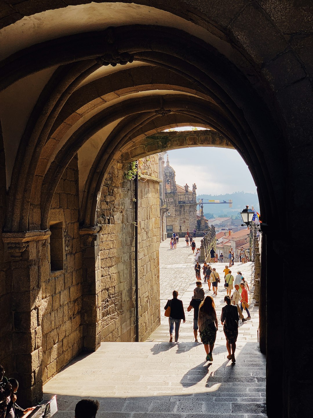 people standing beside concrete walls during daytime