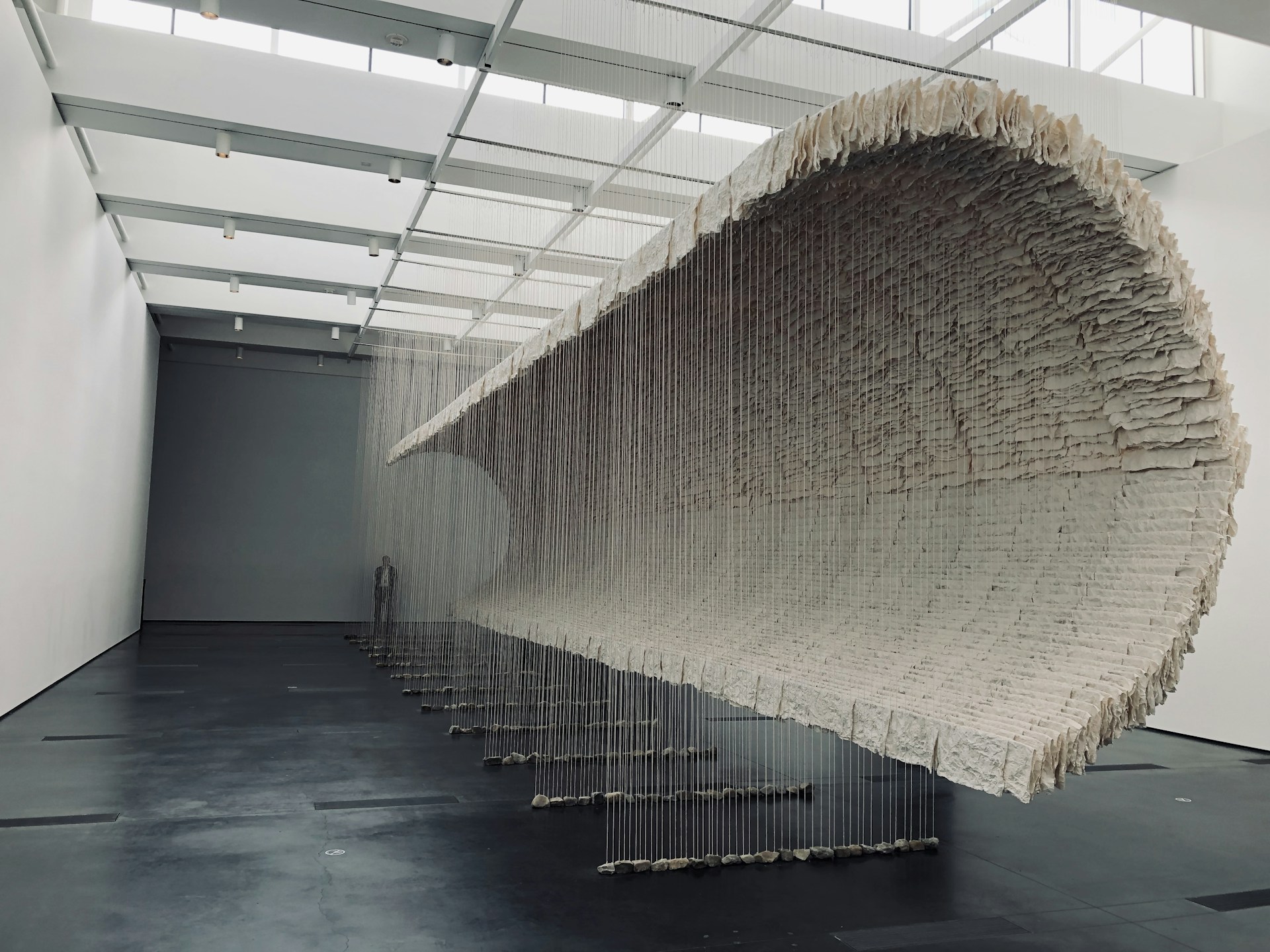 An installation piece in a gallery setting, illustrating the innovative approach of the artist to space and form.