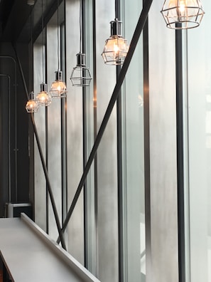 Commercial workspace with new overhead lighting fixtures and tidy conduit runs.