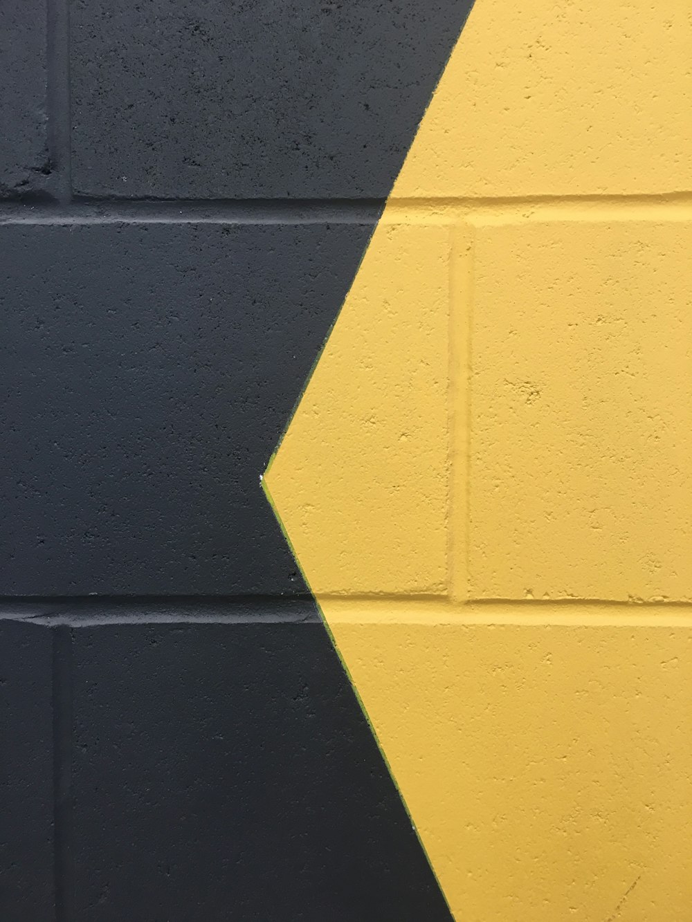 black and yellow paint wall