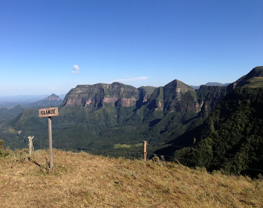 green and brown mountains under blue sky at daytime