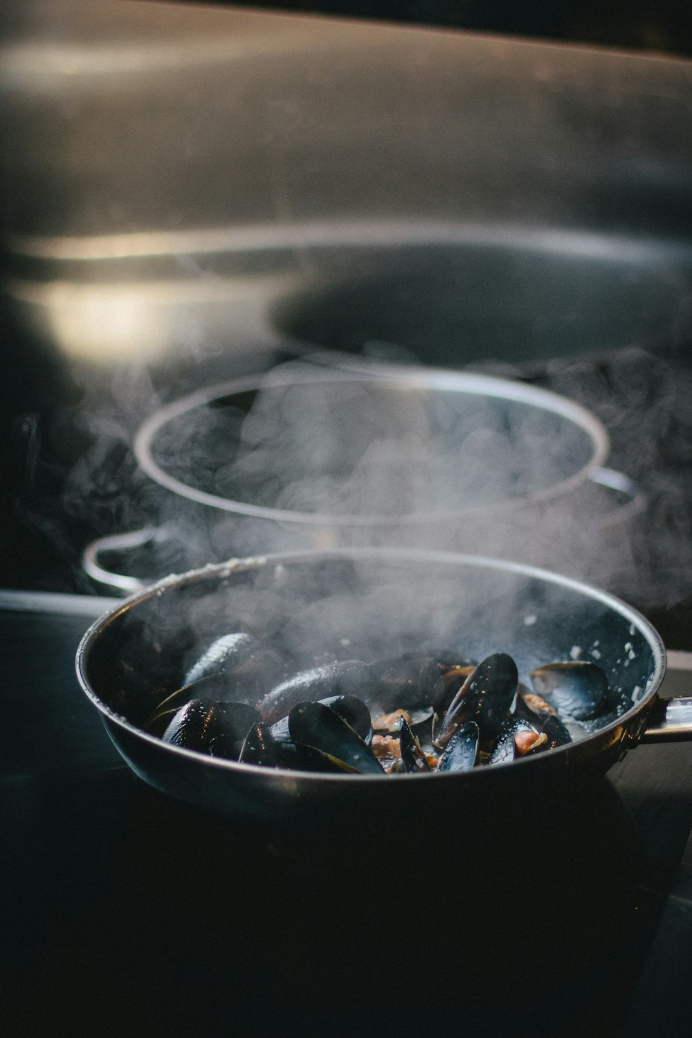 green shells on a pan