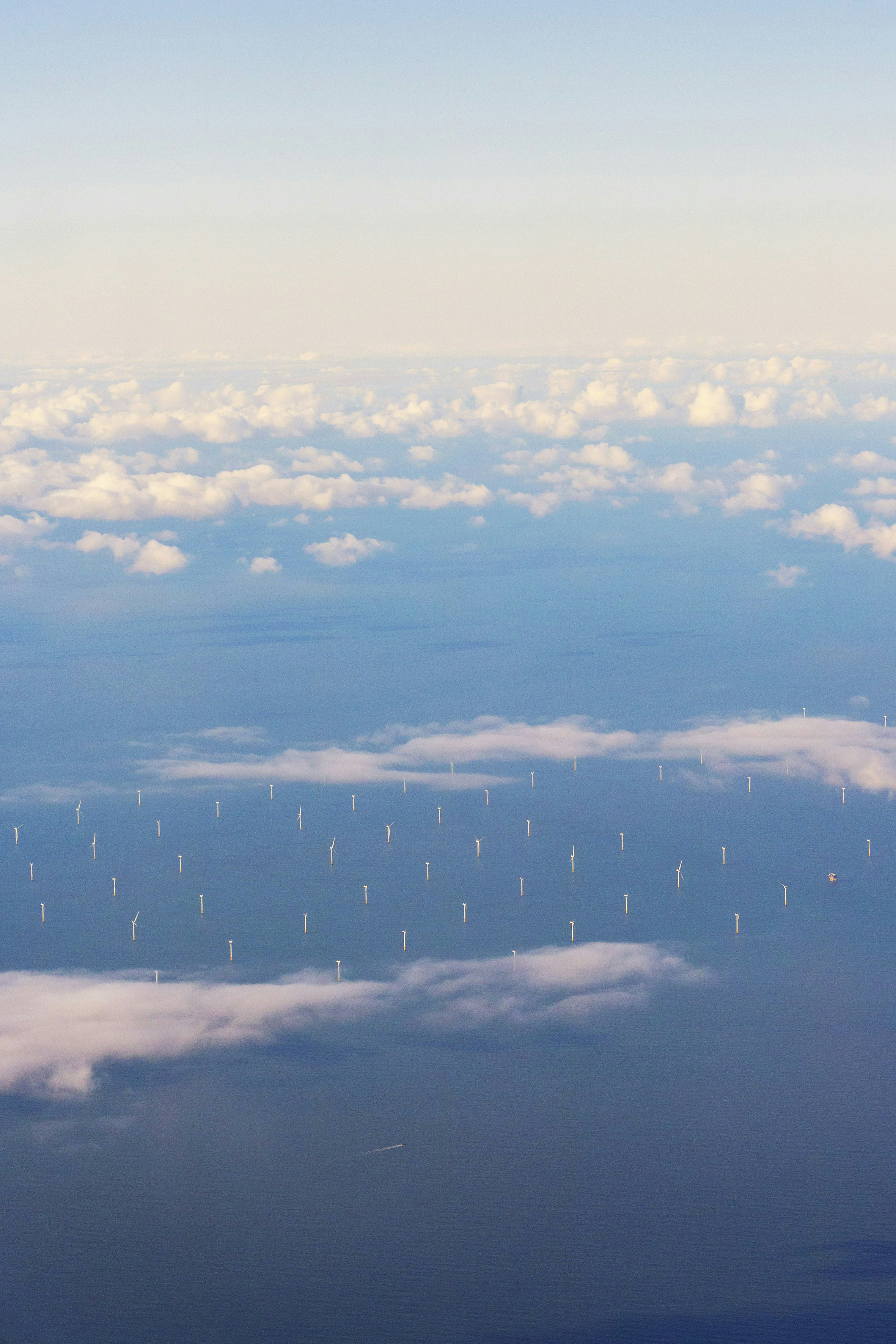 Aerial photo of a wind farm and clouds