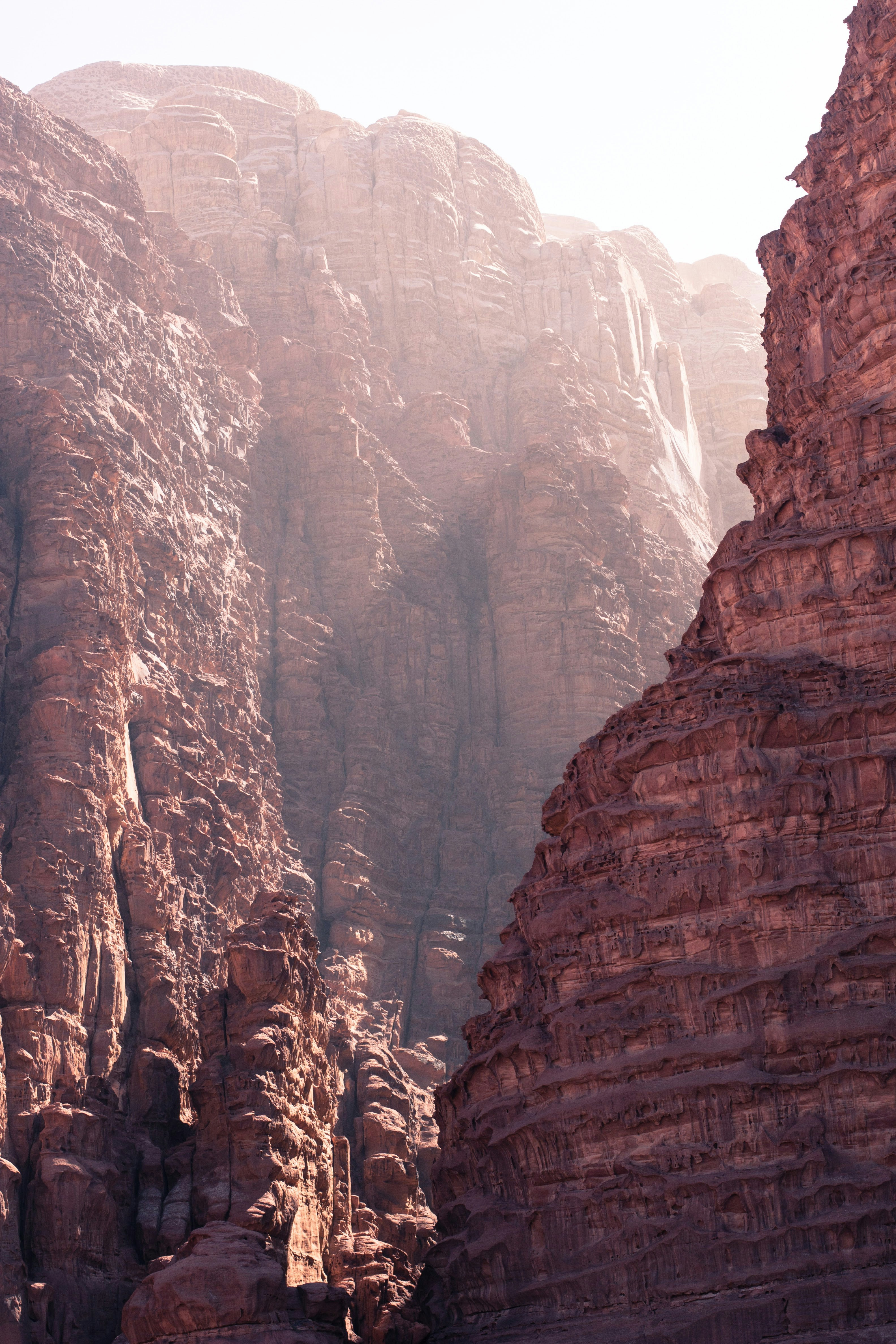 Jordan, Wadi Rum desert. Sunlight hining through two rocks in the desert.