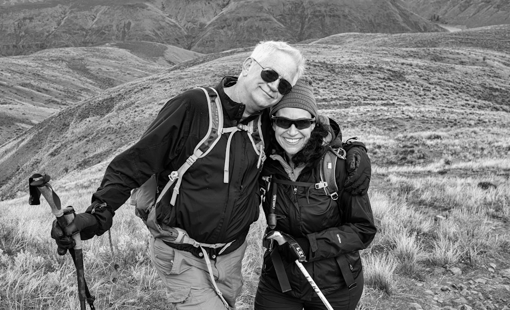 An active mature couple hiking together, staying strong at every age