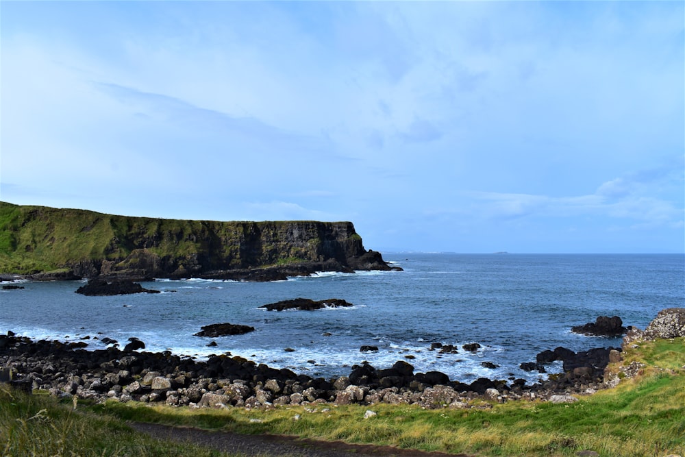 landscape photo of a cliff by the sea