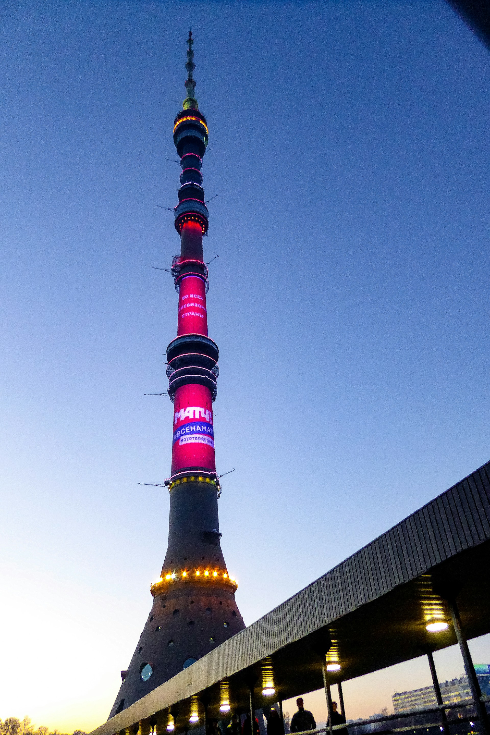 woman wearing yellow long-sleeved dress under white clouds and blue sky during daytime