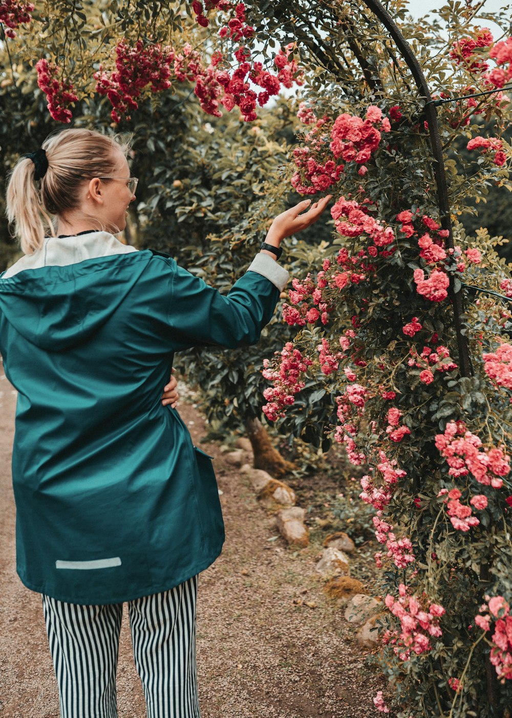 women holding flower during daytime