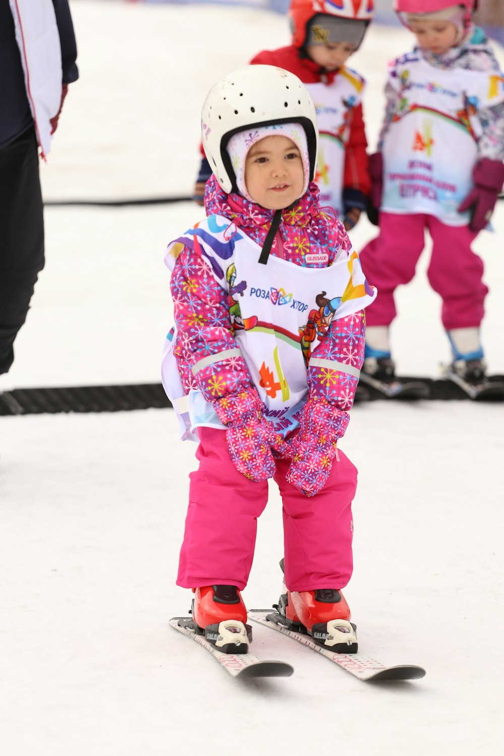 pink and white ski gear
