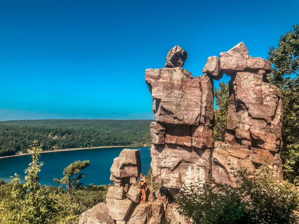 rock formation by a lake