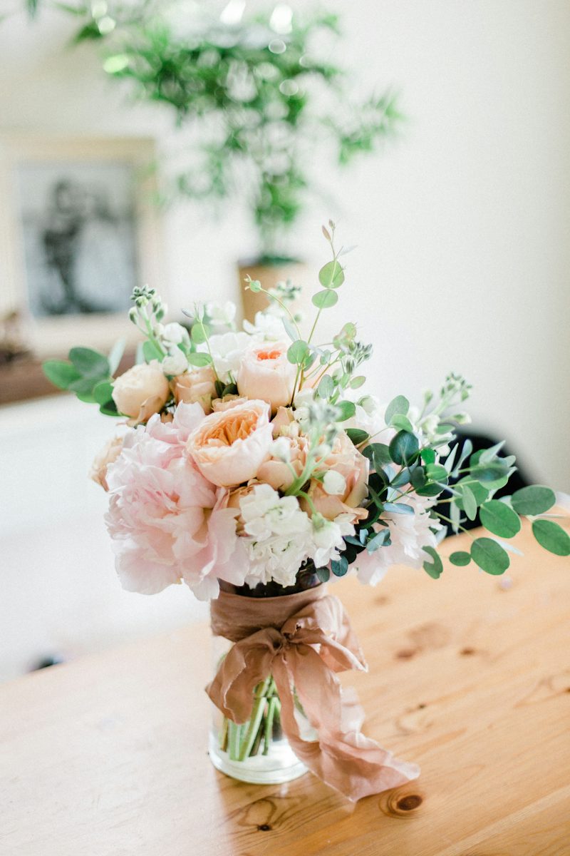 Garden roses staged ahead of an event installation