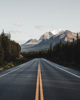 wide road under blue sky
