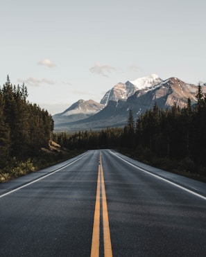 wide road under blue sky