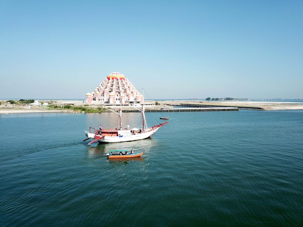 white boat during daytime