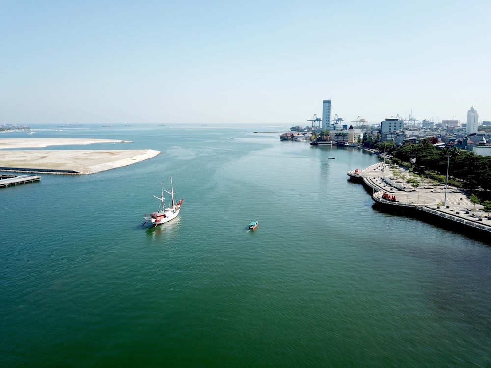 photography of traveling boat during daytime