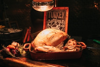 thanksgiving day turkey on a table with a sign that reads turkey.
