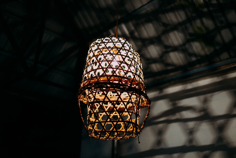 white and brown ceiling lamp close-up photography