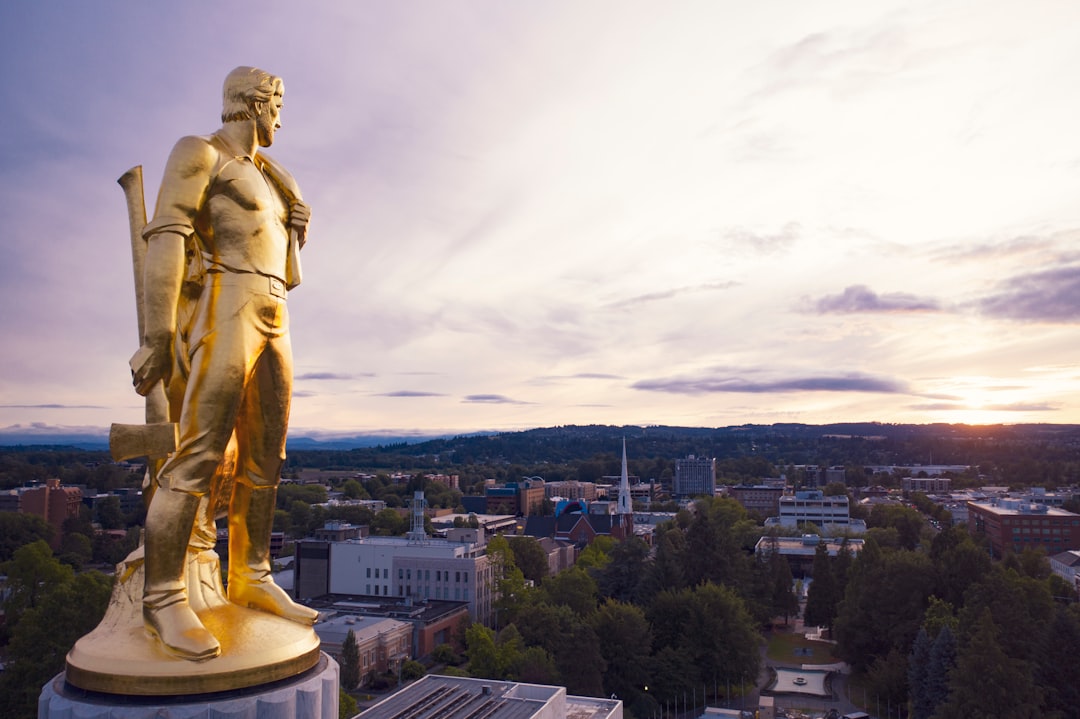 This is the second of two photos I'm uploading of "the gold pioneer" that sits on top of the State of Oregon's capitol building. This 22-foot-tall statue is very shiny so I waited until sunset to take photos. I love that soft glow and the warm colors on the gold finish. Quite appropriately, he’s looking to the west. He also appears to be looking directly at the setting sun...ouch! Photo was taken with a drone...in case that wasn't obvious... 