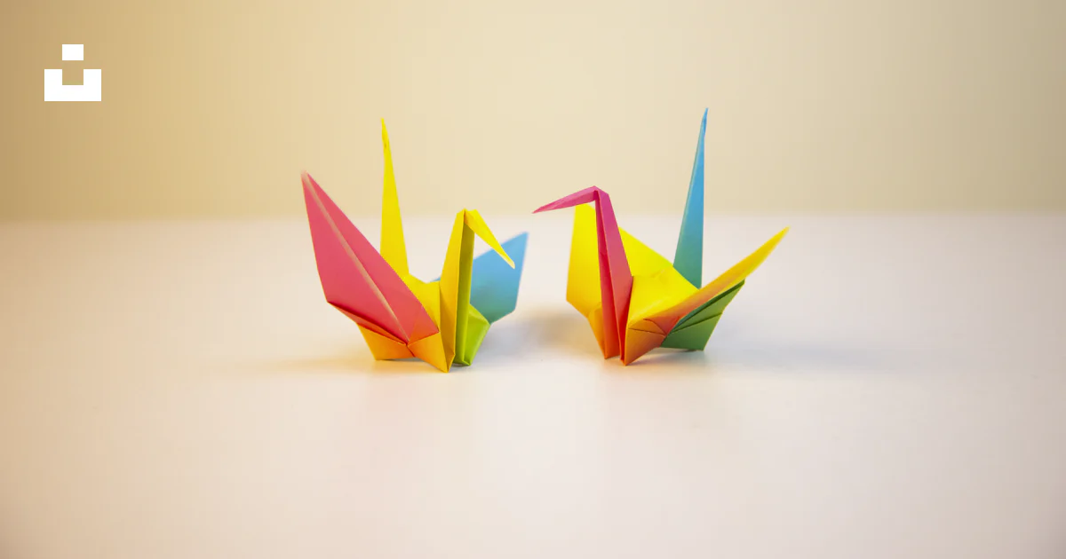 Two yellow-red-blue papers photo – Free Paper Image on Unsplash