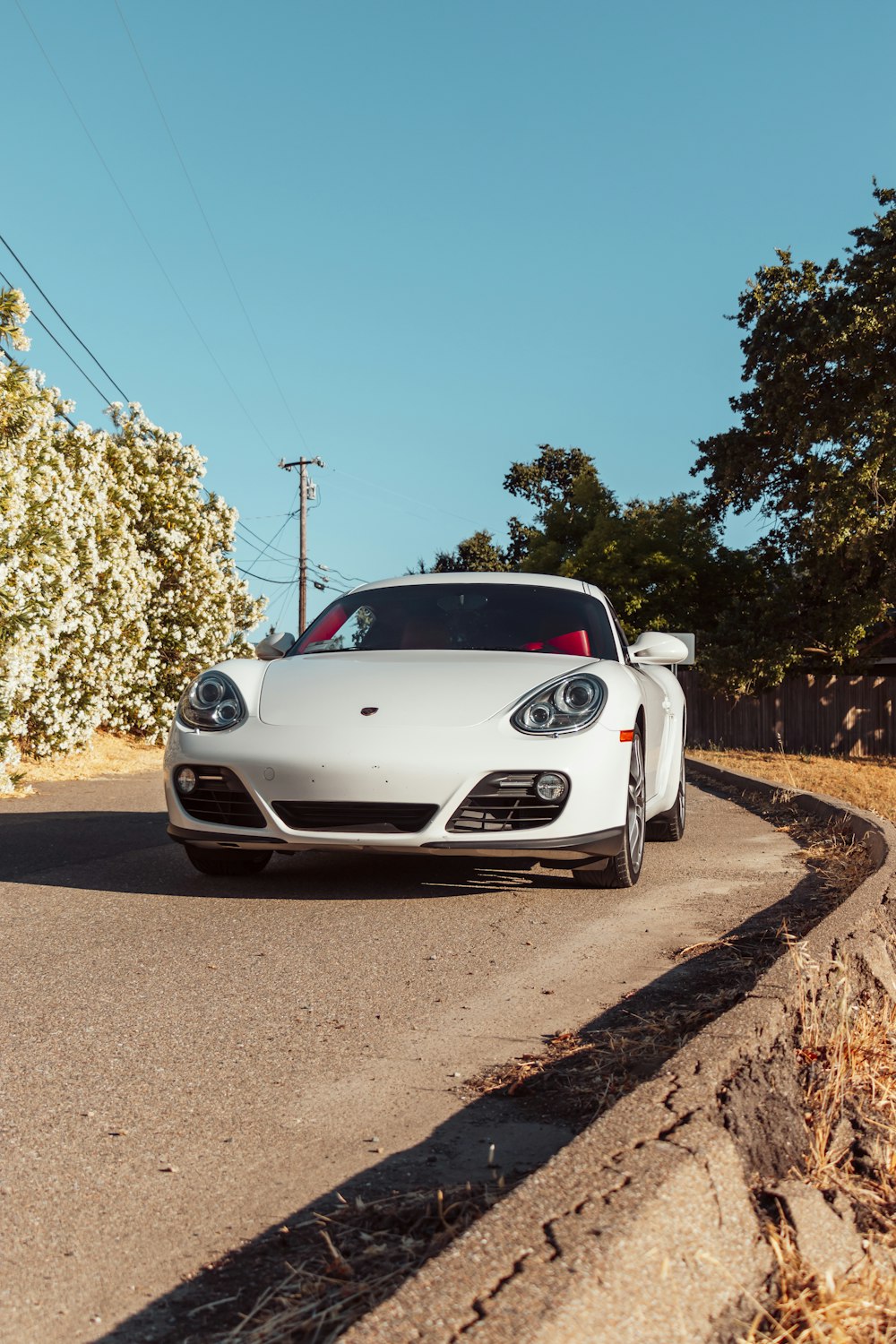 white car on road