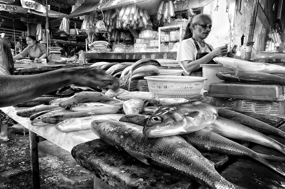 grayscale photo of raw fish