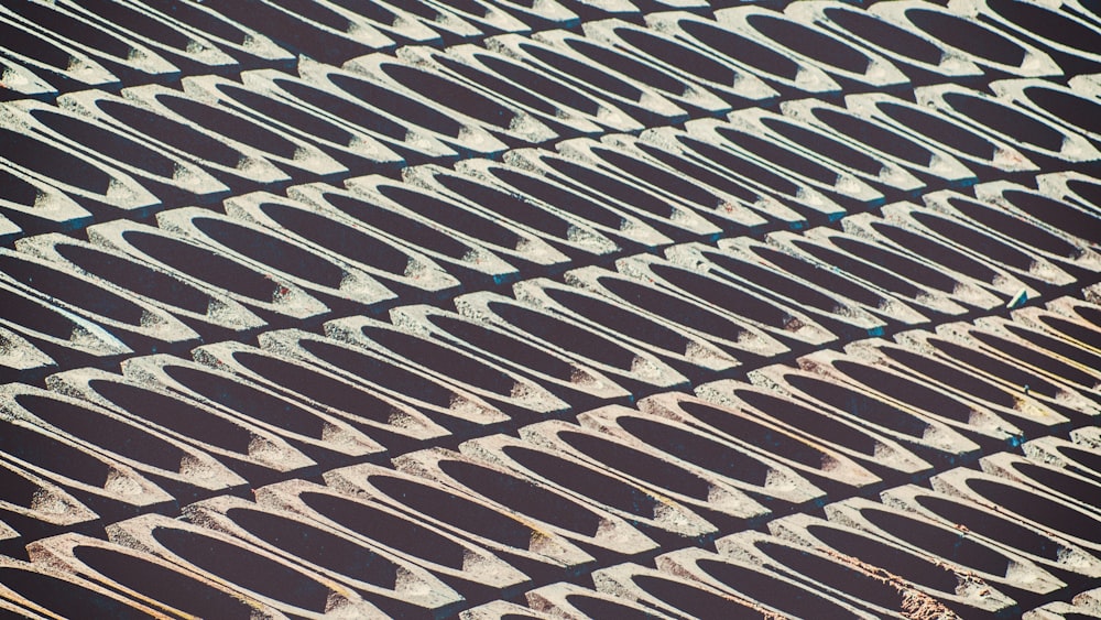 a close up of a pattern made of metal bars