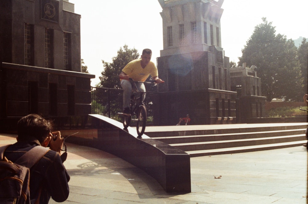 man riding BMX bike