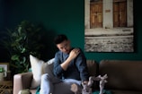 A compassionate therapist listening to a client in a cozy setting.
