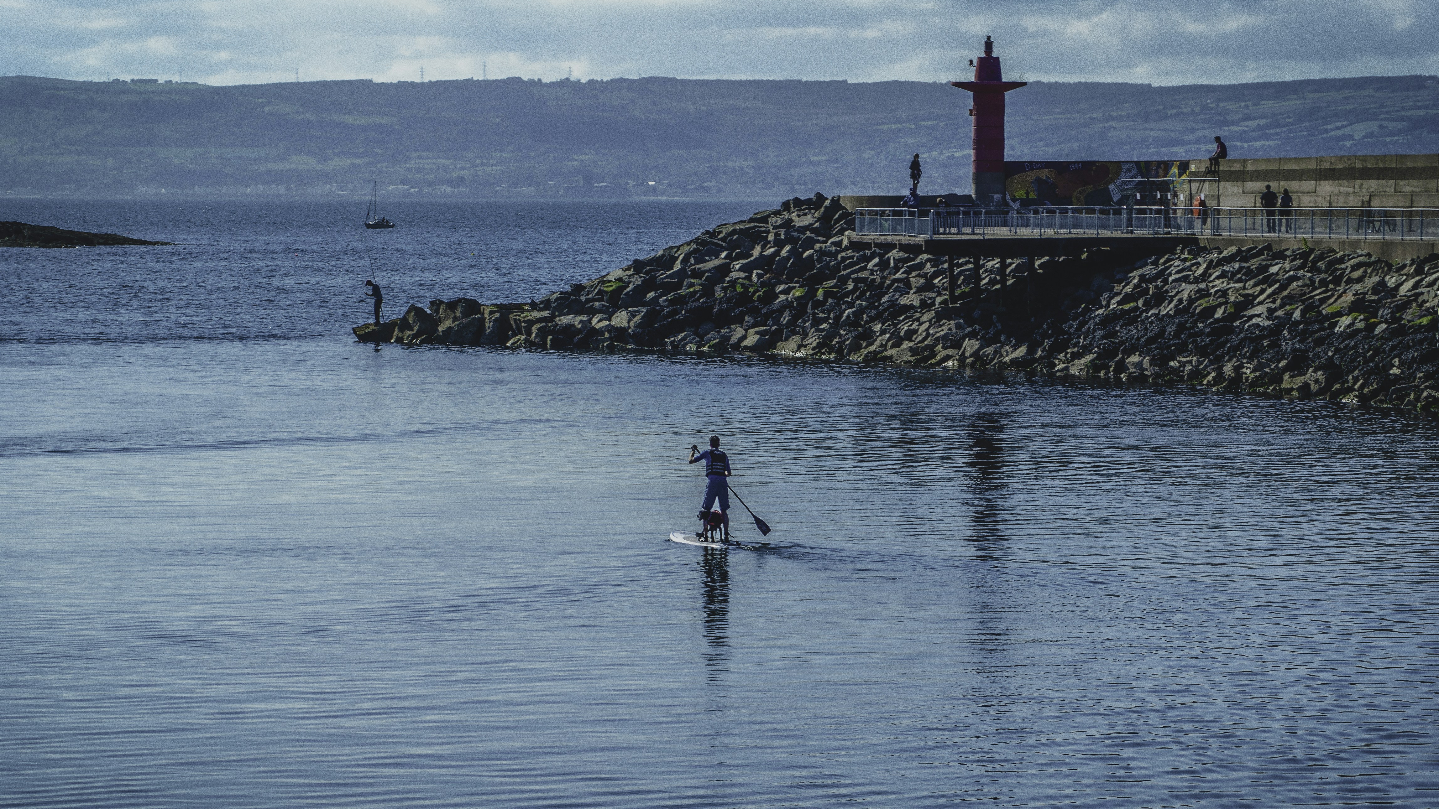 person riding surfboard during daytime