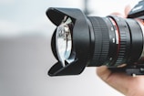 shallow focus photography of black zoom lens