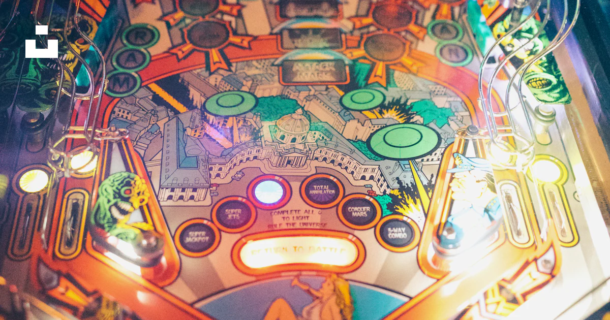 Blue and multicolored pinball machine close-up photography photo – Free ...