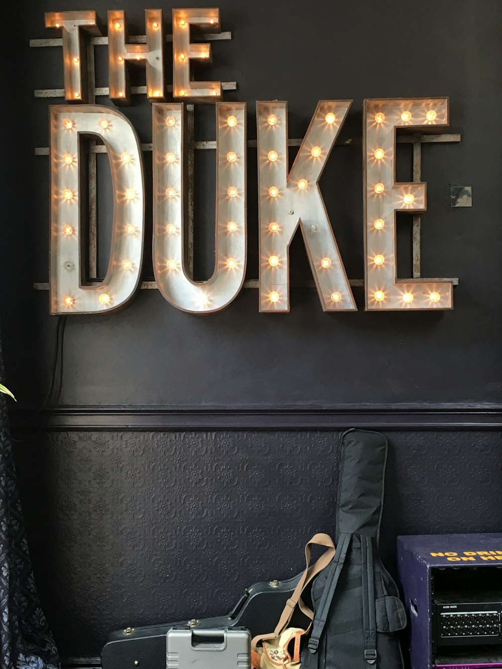 The Duke signage