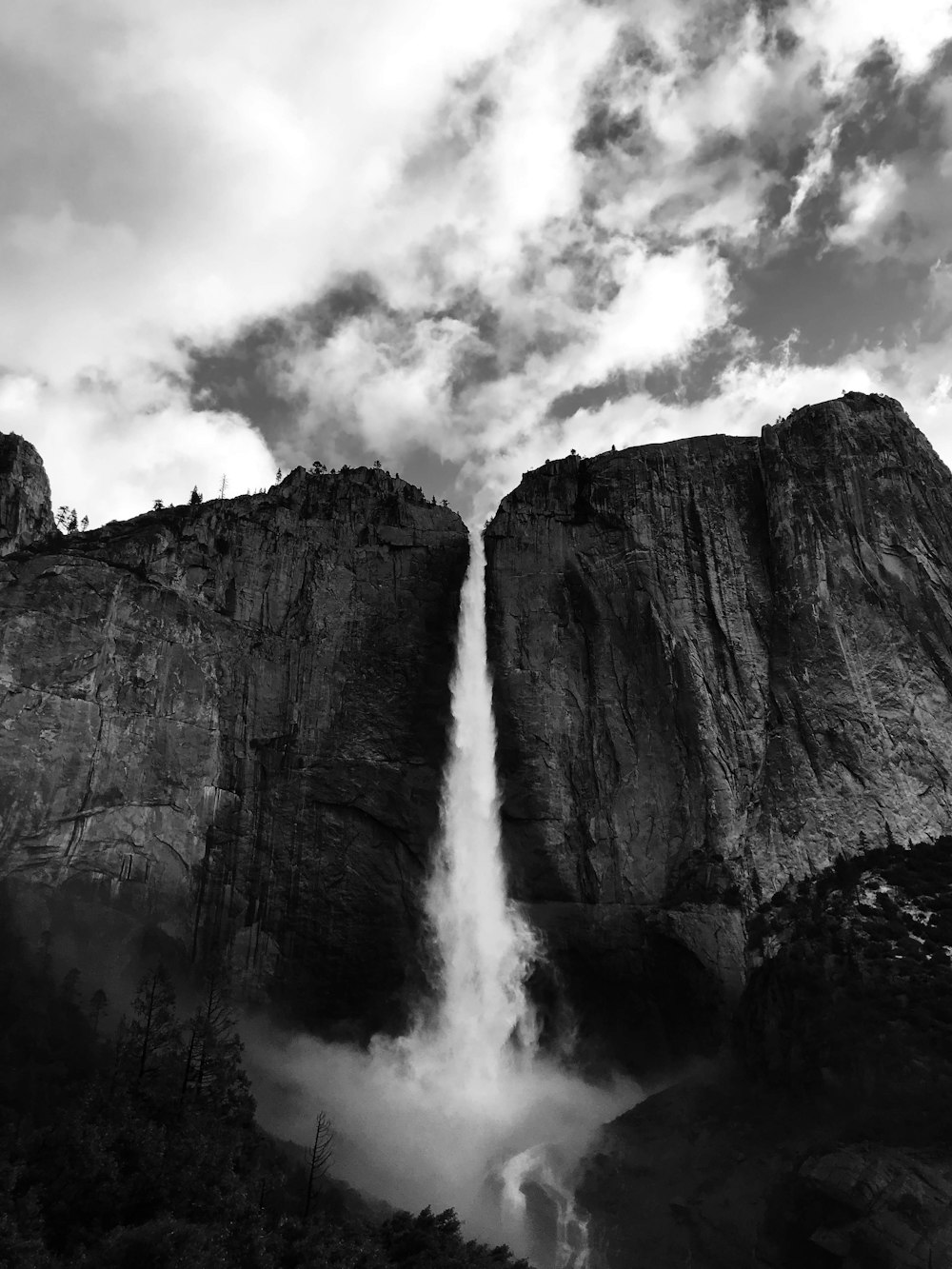 grayscale photography of waterfall