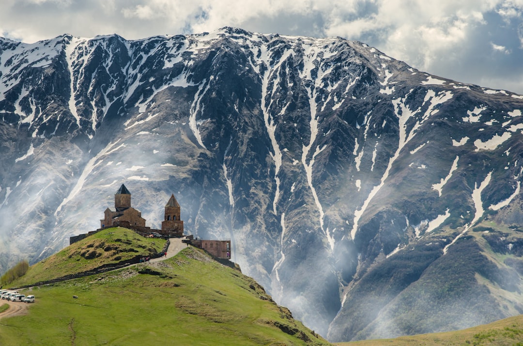 gray concrete building on hill, Trinity Gergeti Church, Kazbegi, Georgia</p></figure><p>This is my favorite photo. If you want to share it on Instagram, I would appreciate if you mention my account @imangm