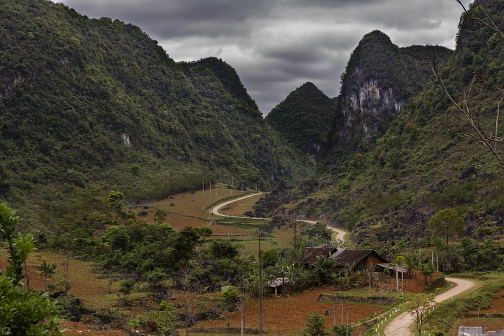 clear winding road below the hills