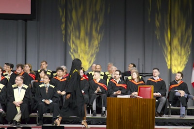 graduate walking on stage