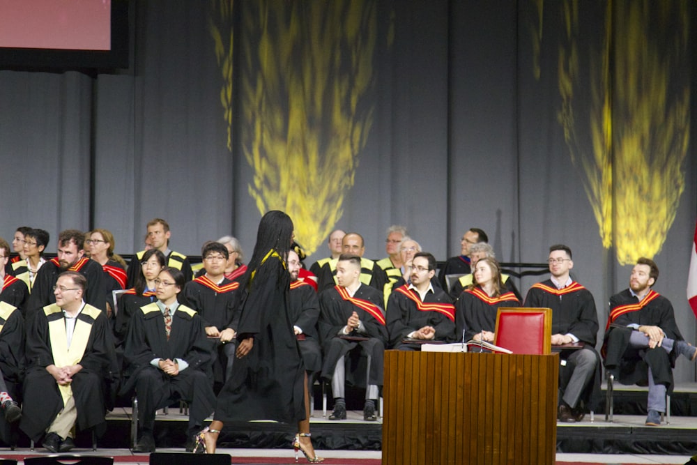 graduate walking on stage