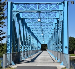 grey and blue metal bridge during daytime