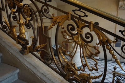 Elegant custom-made wrought iron balcony railing with classic design.