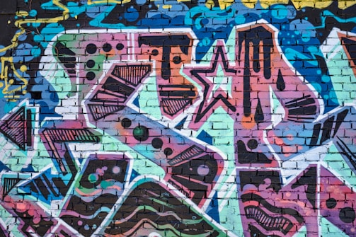 A vibrant mural painted by the Brownstone family, blending cultural symbols and bold colors.