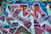 A vibrant street mural in Philadelphia featuring iconic hip hop symbols and city landmarks.