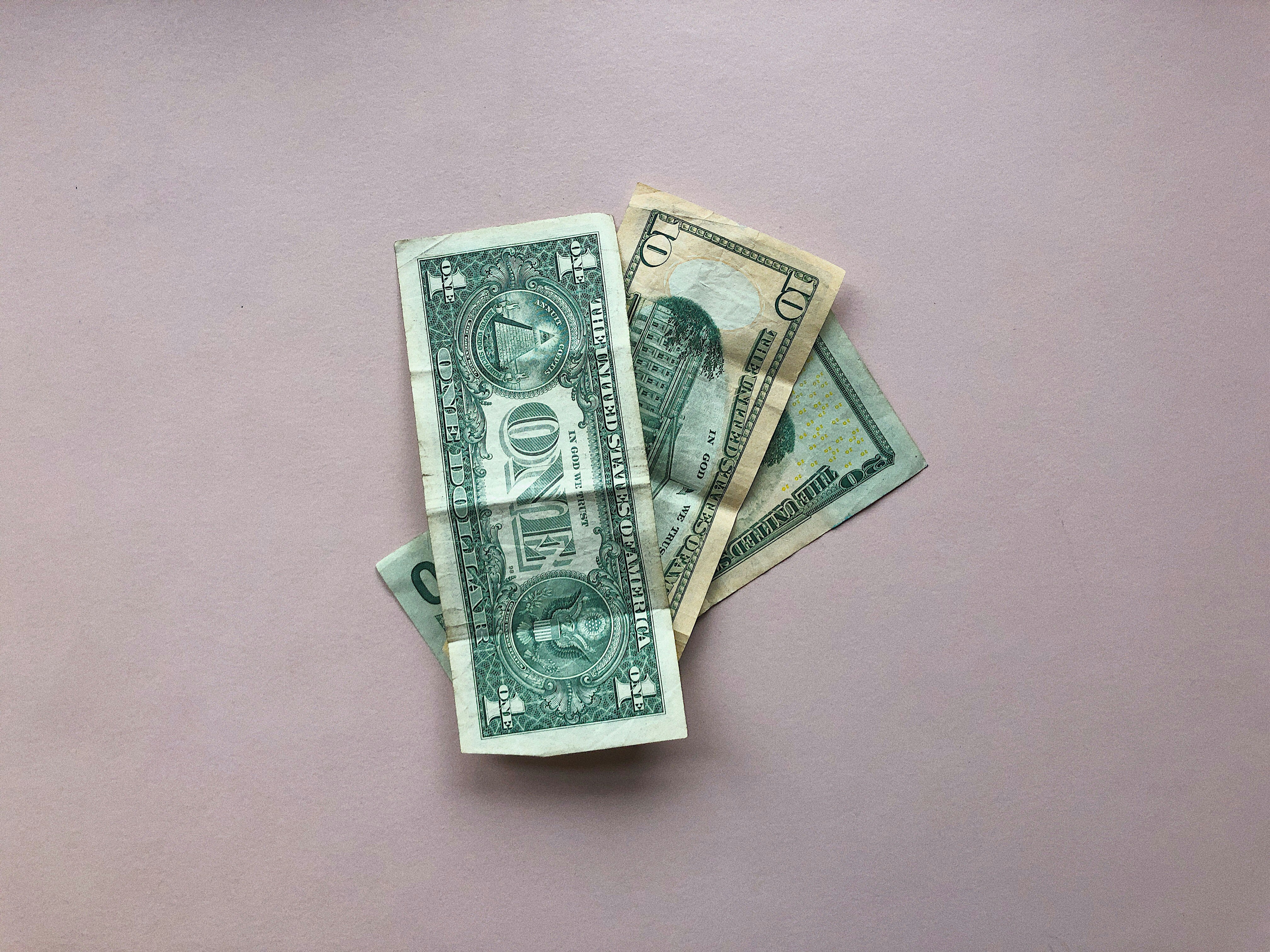 The back of an American one, ten, and twenty dollar bills, United States currency.