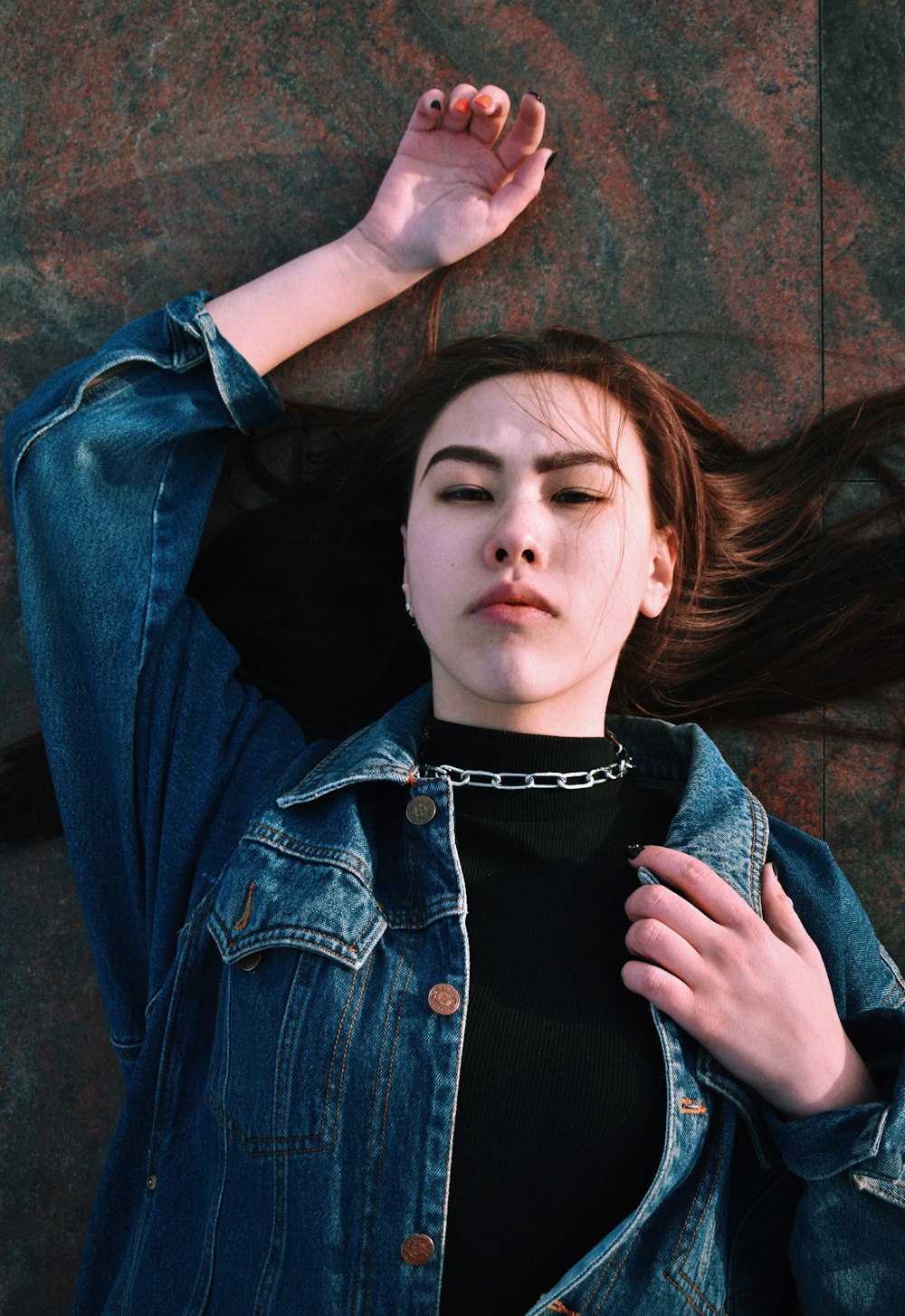 woman in blue denim jacket