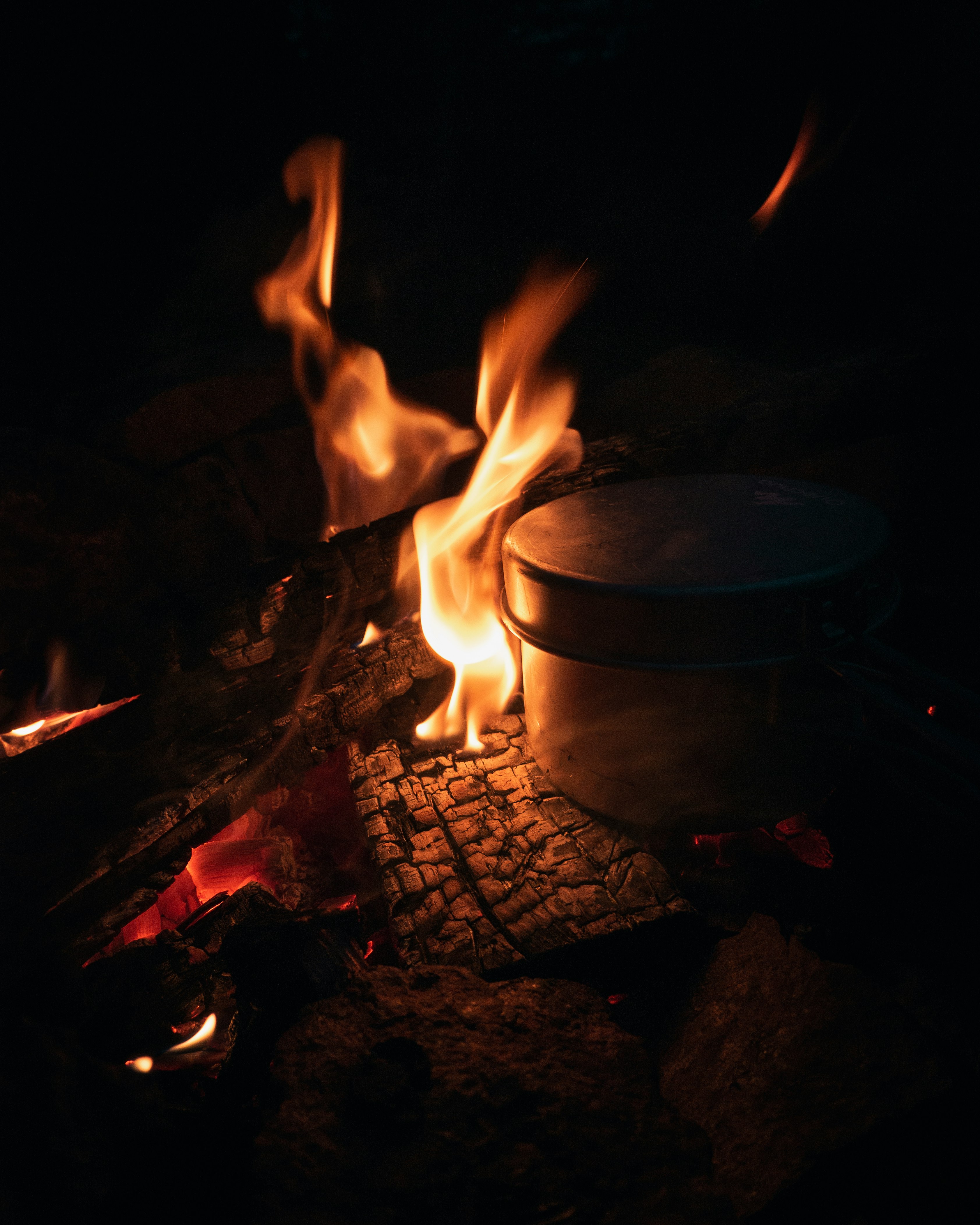 cooking pot beside fire