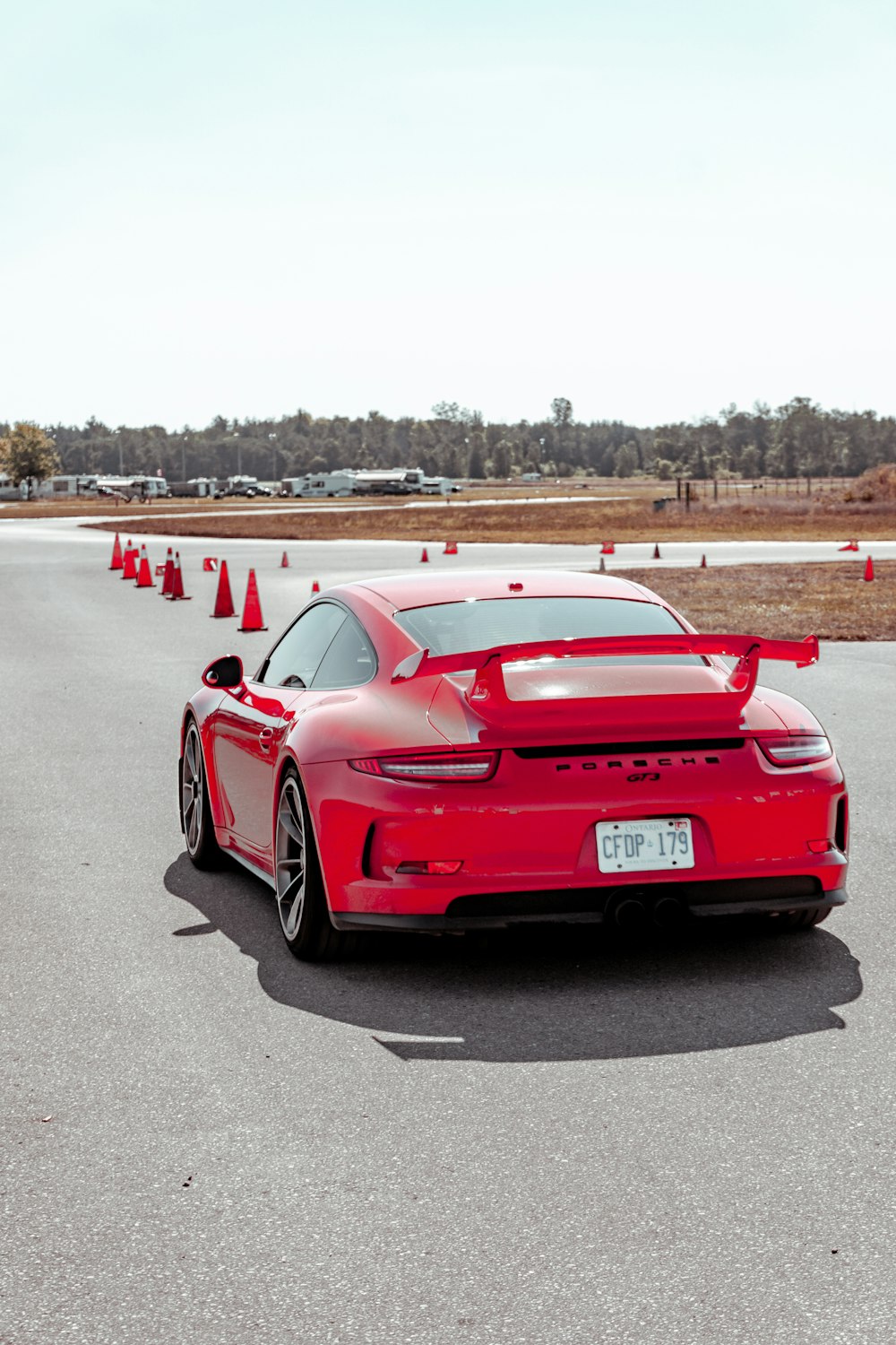 red coupe on road