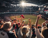 Families cheering from the stands during a lively community game.
