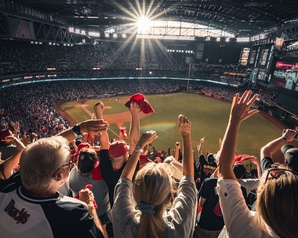 people watching baseball